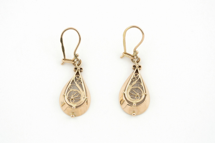 pair of yellow gold earrings